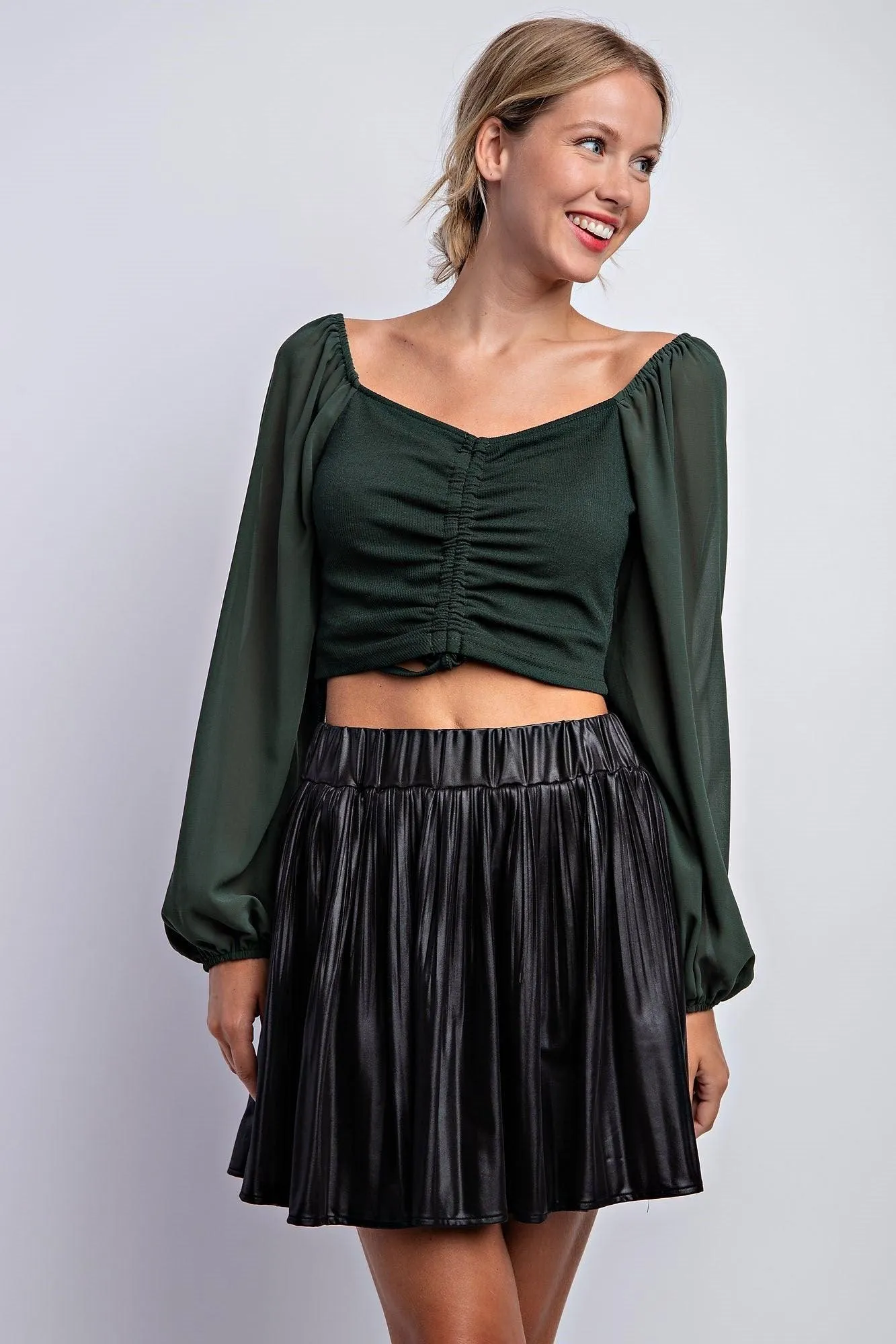 pleated faux leather mini skirt