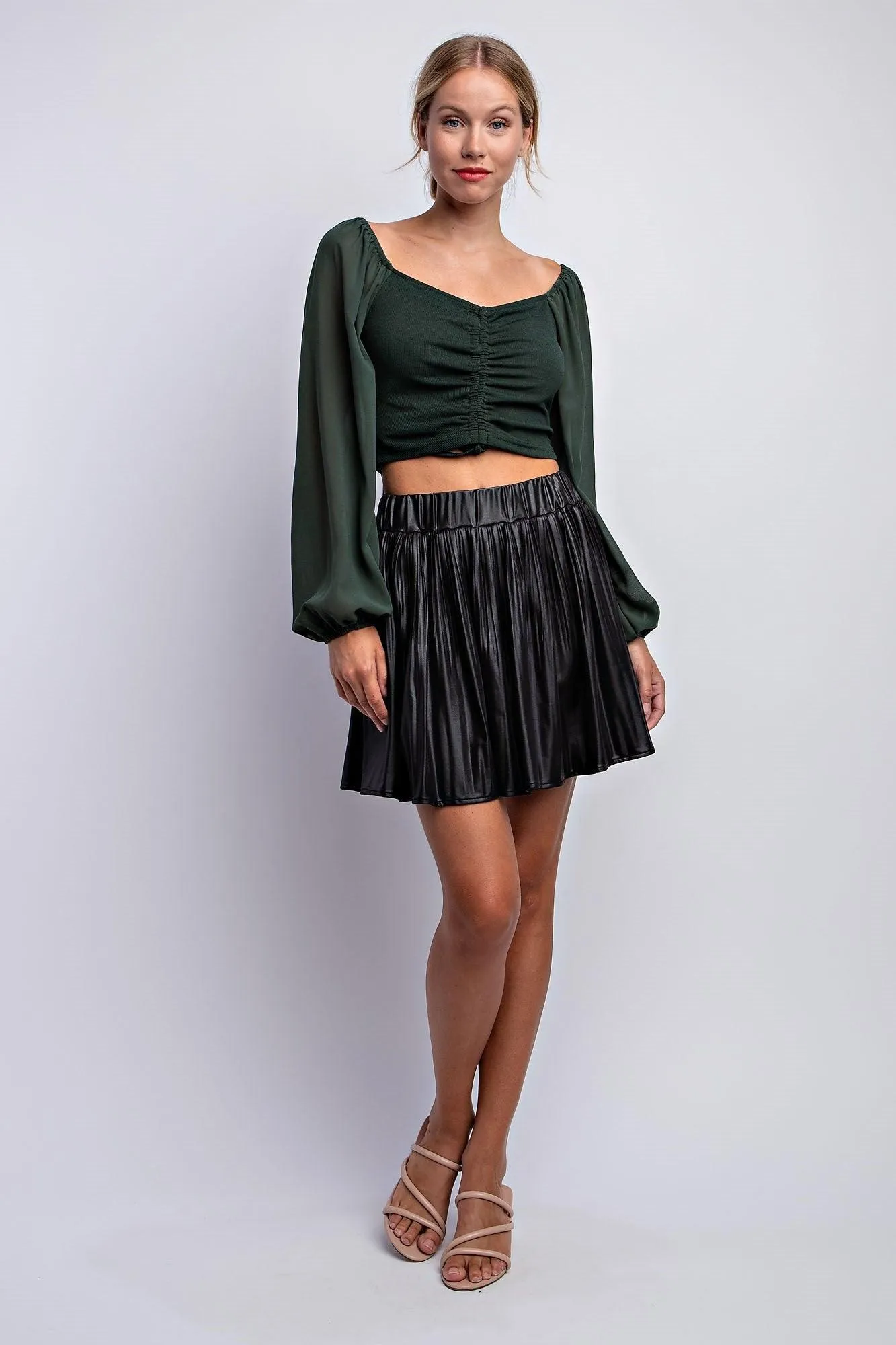 pleated faux leather mini skirt