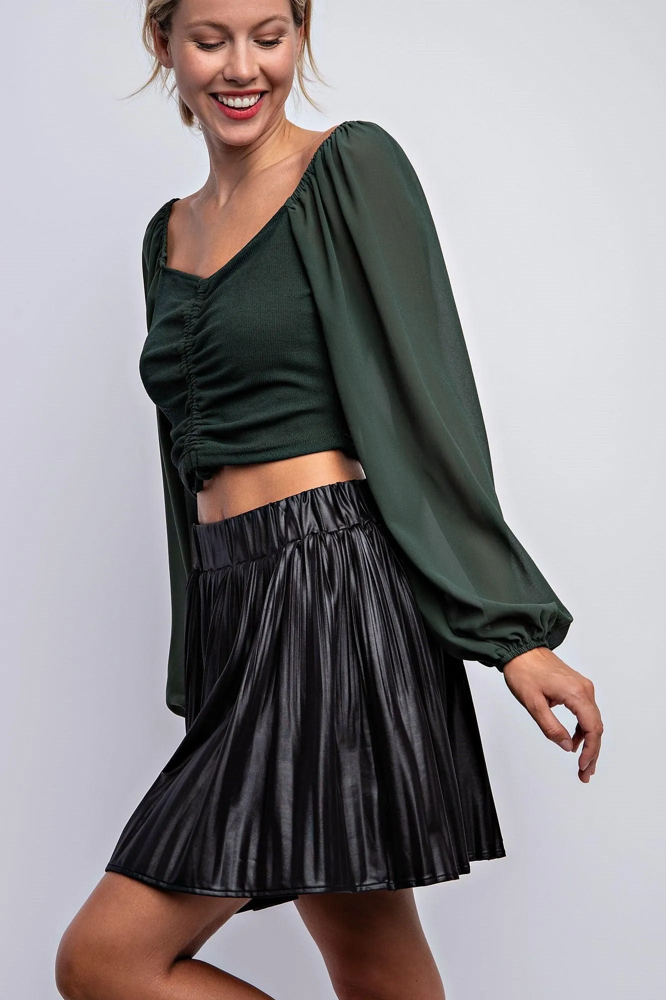 pleated faux leather mini skirt