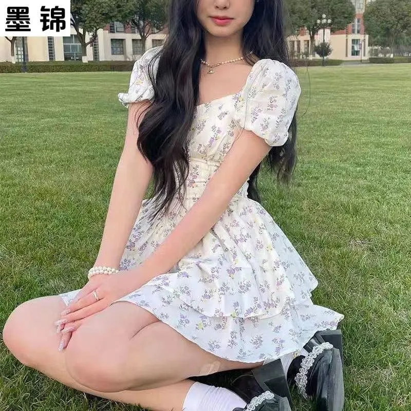 "Waist-cinching Off-shoulder Floral Dress with Puff Sleeves and Princess Style for 2023"