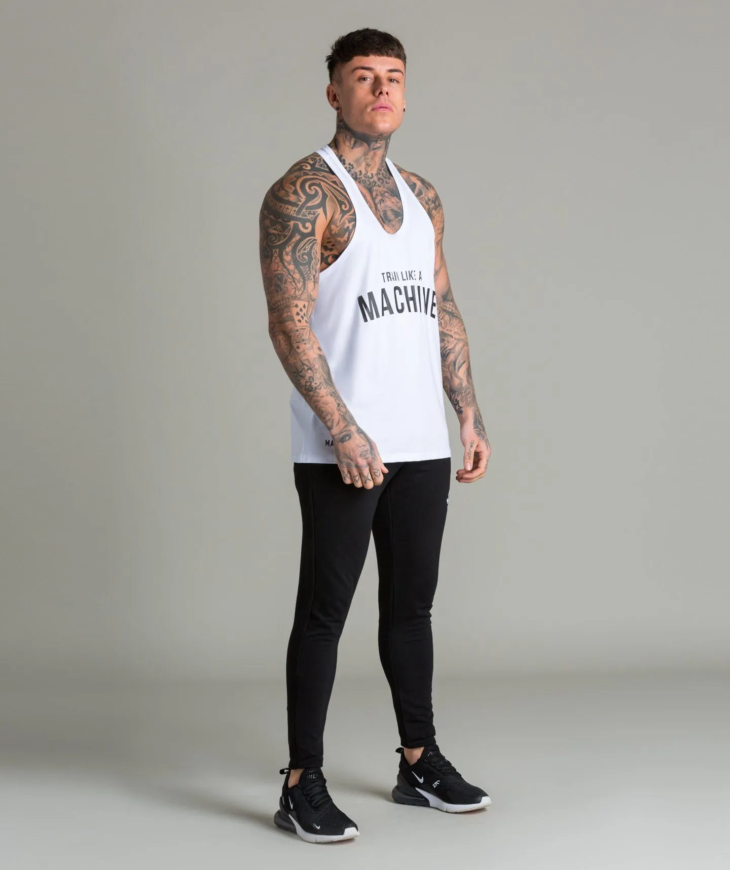 Train Like A Machine Tech Stringer Vest (White)